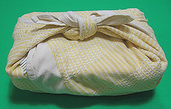 Box lunches wrapped in dish towel
