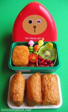 Triangular onigiri bento box lunch