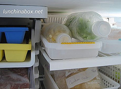 Frozen corn & green onions in plastic water bottles