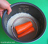 Steaming carrots with rice in a rice cooker