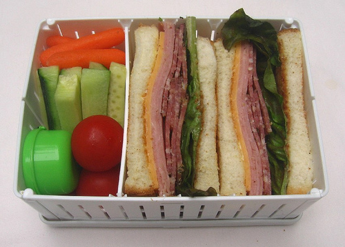 Mixed meat sandwich in collapsible sandwich holder