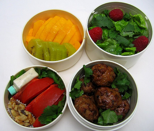 Meatballs and gold kiwi salad lunch